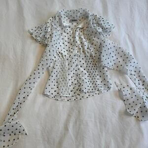 Guizio white and black polka blouse with ruffles and tie detail